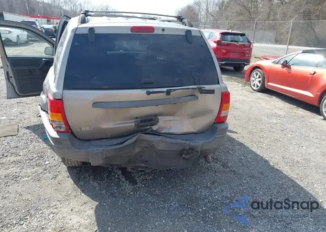 2001 Jeep Grand Cherokee Laredo из США, поврежденный, VIN 1J4GW48S01C657952